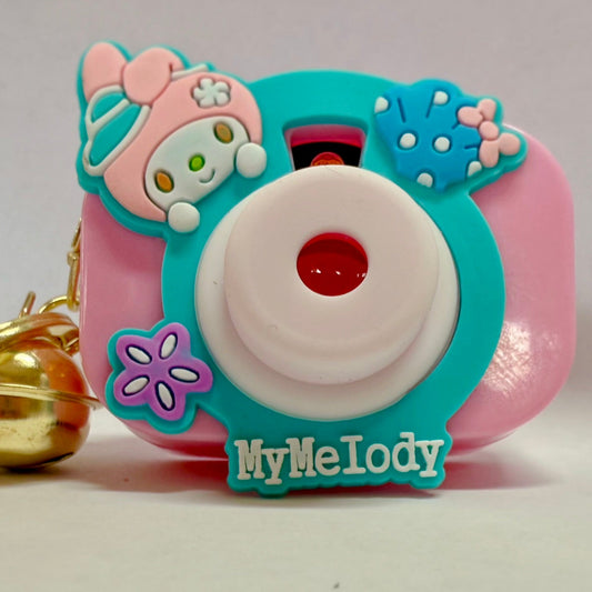 Kuromi mini projector keychain - cute Sanrio character projects colorful LED images, perfect for bags or party favors