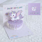 D pop-up cake birthday card in purple color, unicorn theme, perfect for birthday greetings, parties, or decorations
