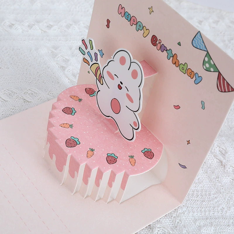 Colorful 3D pop-up cake birthday card with bunny pink design, great for kids' birthdays or special occasions