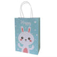 Cute bunny-themed goody bag with fun surprises, perfect for kids' birthday parties or celebrations, on a blue background.